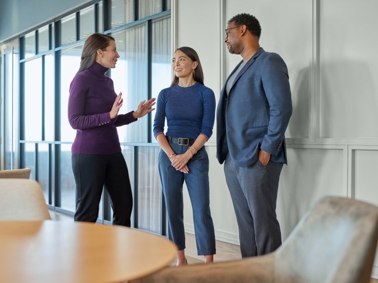 Perkins Coie lawyers talking and smiling