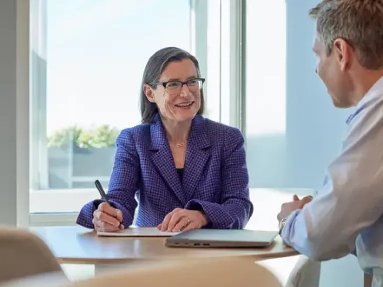 Katie O'Sullivan and Kirk Soderquist chatting