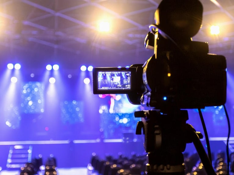 Camera pointed at concert stage