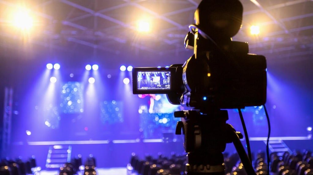 Camera pointed at concert stage