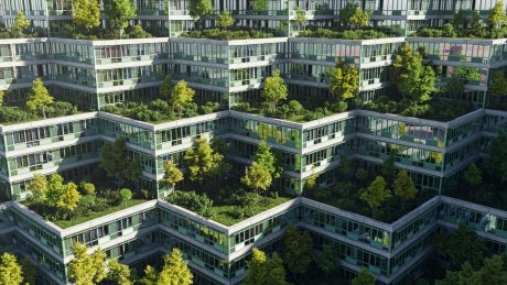 a building with green rooftops