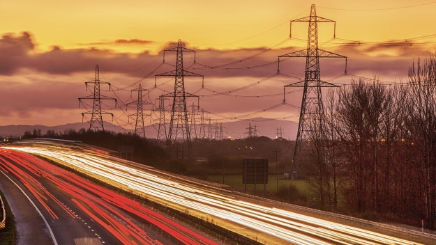 Powerlines next to busy road