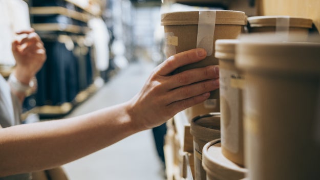 Shopper picking up container